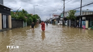 Flooding leaves 9 dead, 6 missing, tens of thousands of homes inundated across central region